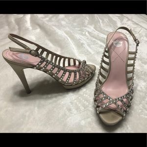 Tan/nude colored 5” heels.